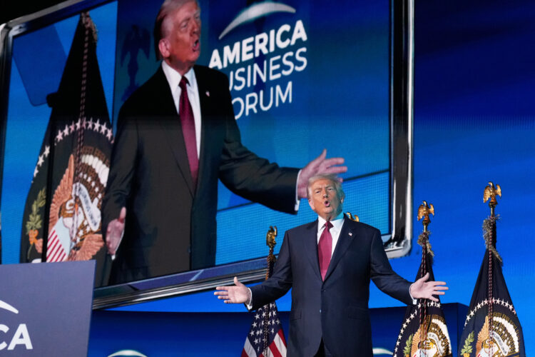 President Donald Trump, in Miami, brags about the economy despite an election-night rebuke